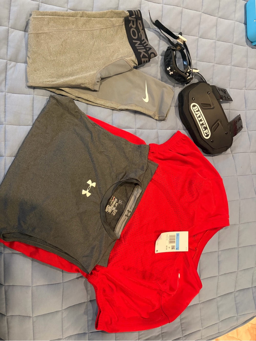 Youth football bundle under Armour battle back plate Nike practice jersey